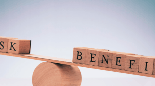 risk-benefit-wooden-scale